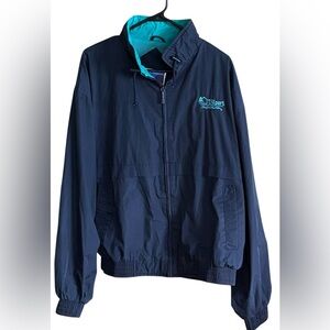Men's Port Authority extra large navy blue, full-zip windbreaker.